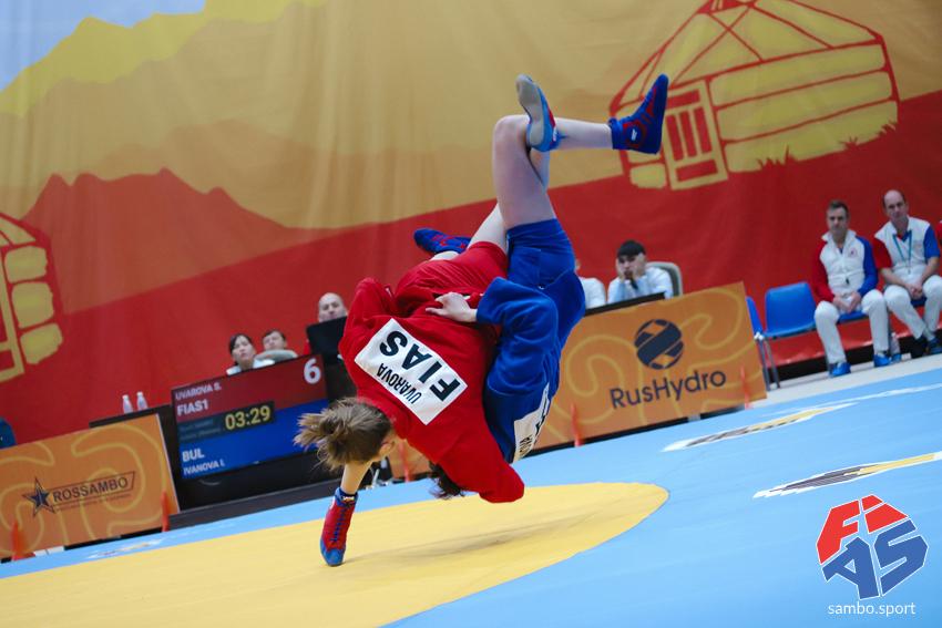 Athletes training grappling