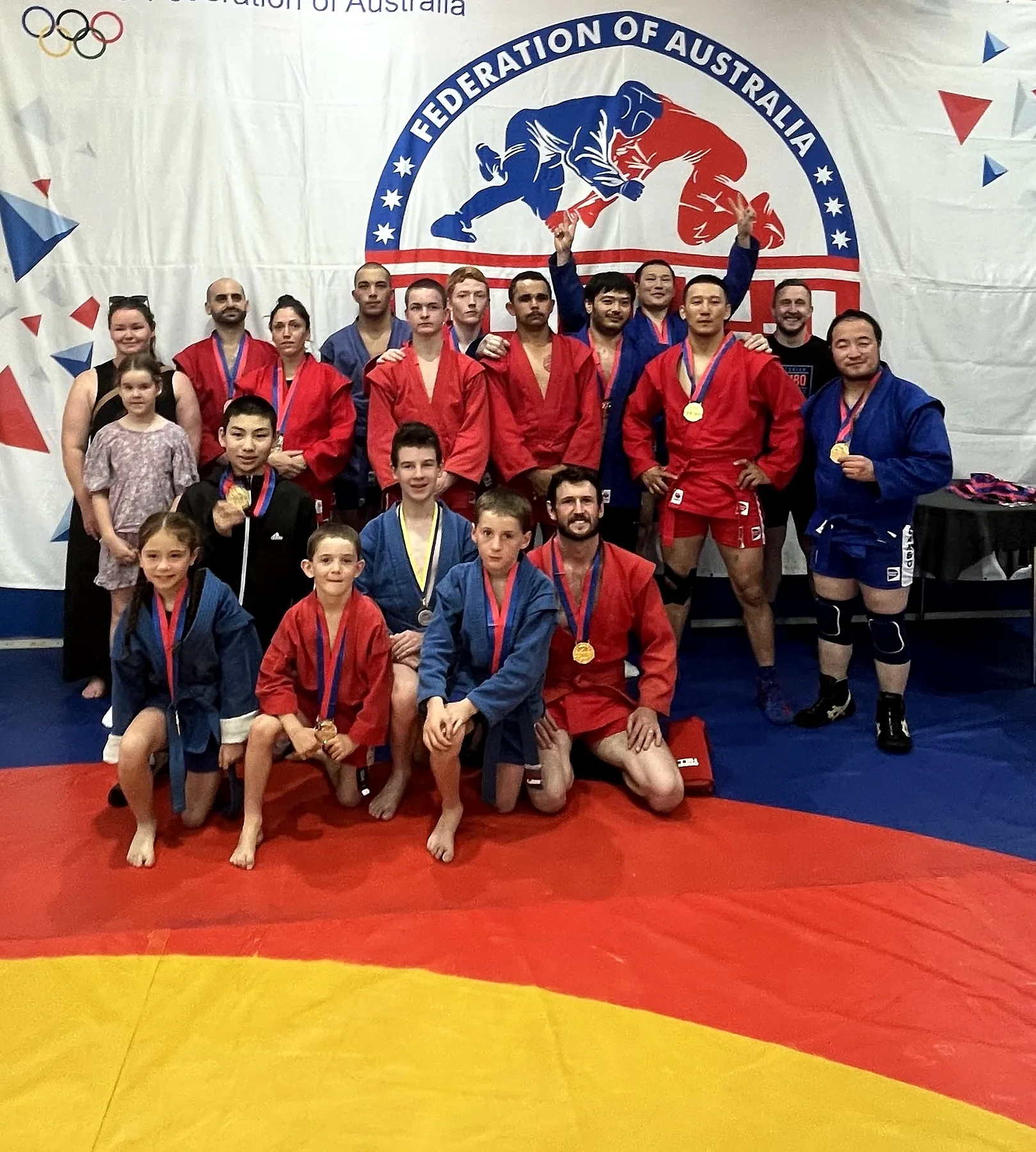 Group of Australian SAMBO competitors and medallists at a national event
